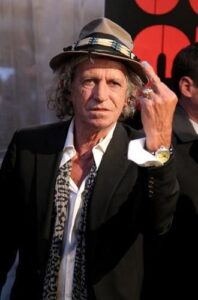 Guys with painted nails: Keith Richards shows his painted nails proudly.