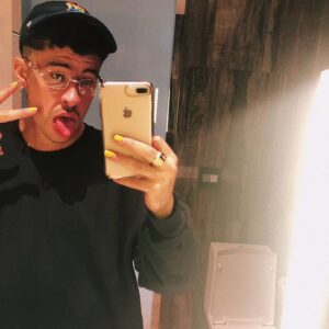 Guys with painted nails: Bad Bunny loves painting his nails.