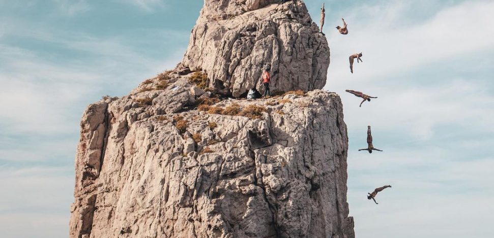 What is Cliff Diving? Heights and records. Picture composition to show a woman doing cliff diving.